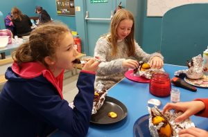 Guides eating indoors