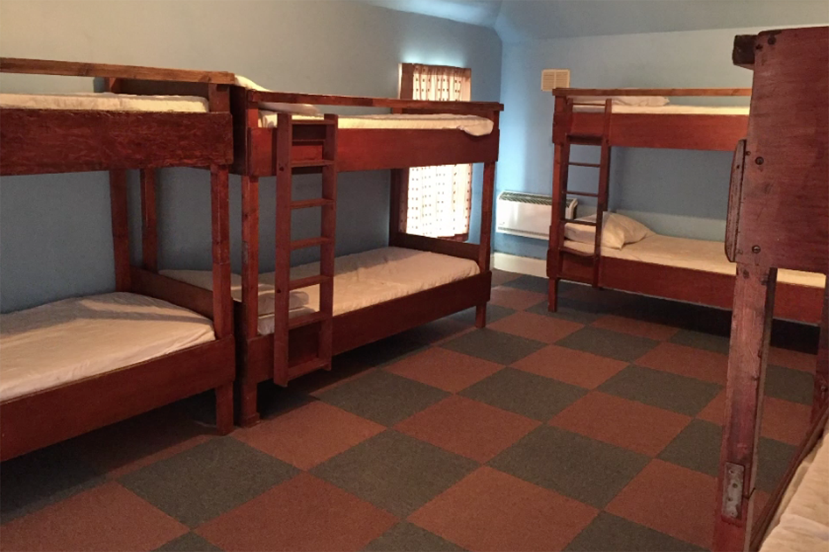 Dorm room with 5 bunk beds